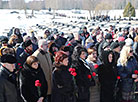 Flower ceremony at the Eternal Flame  in Khatyn Memorial